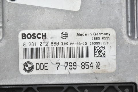 KOMPUTER STEROWNIK BMW E87 E90 7799854 0281012880