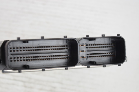 KOMPUTER STEROWNIK BMW 7796571 0281011564